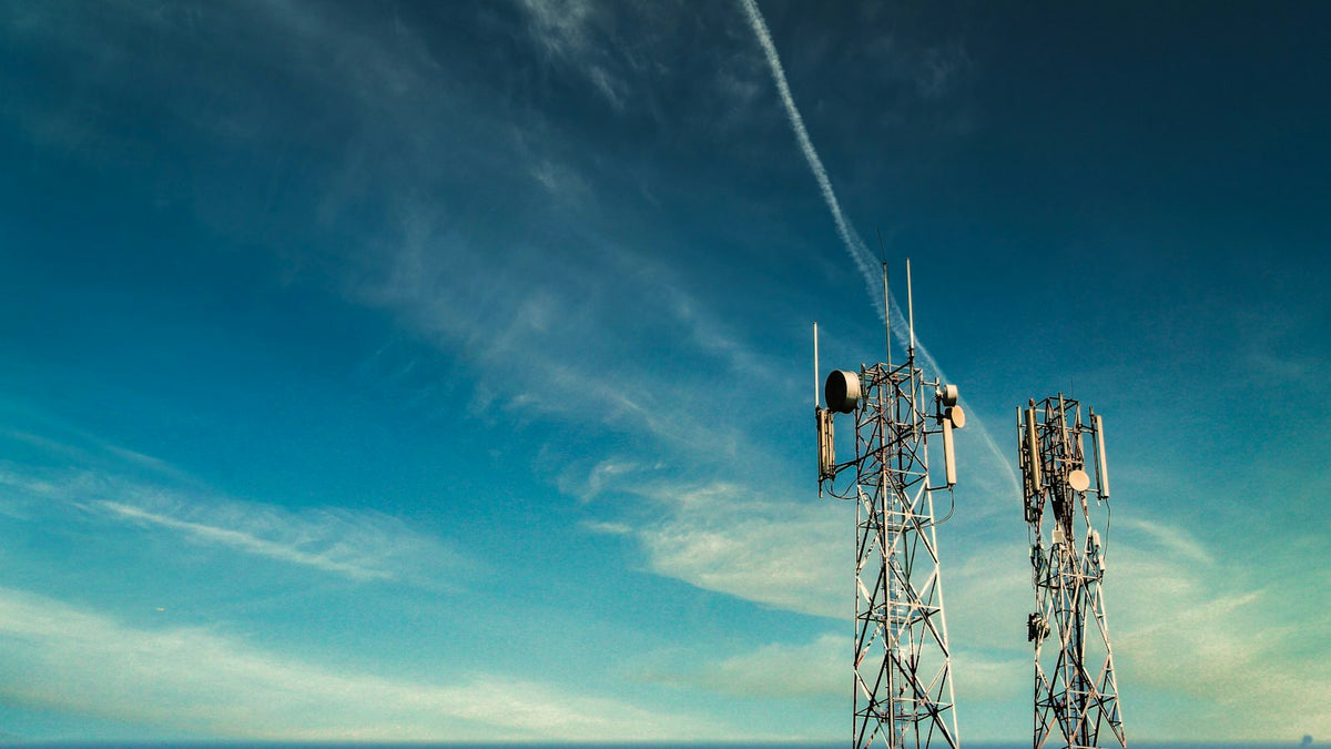 Telecom tower against a blue sky
