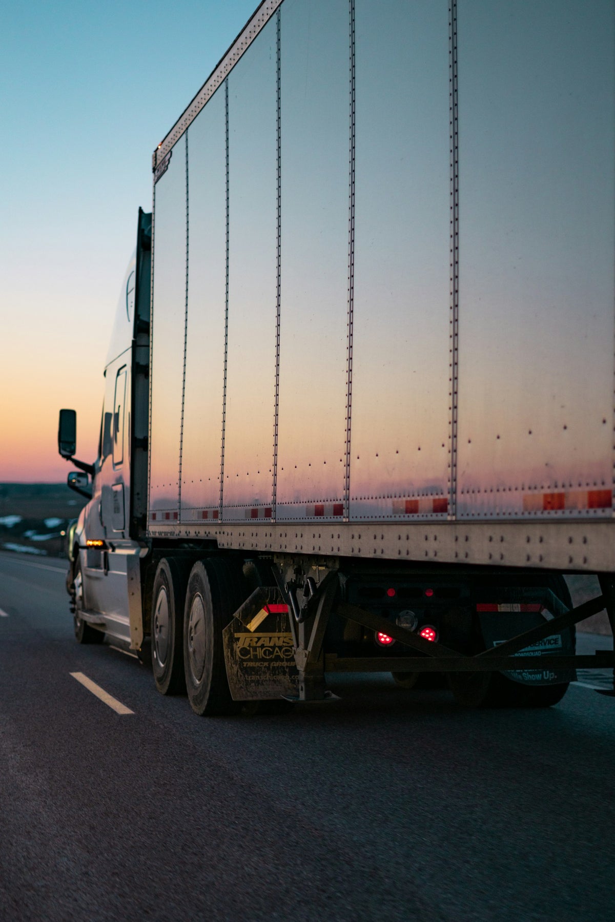 Freight truck on the highway delivering equipment