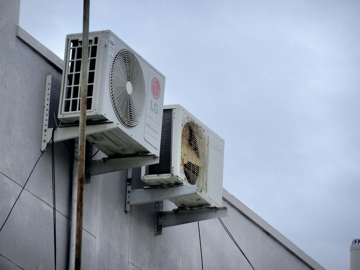 Air conditioner mounted to the side of a commercial building